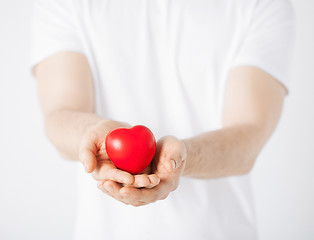 Image showing man hands with heart