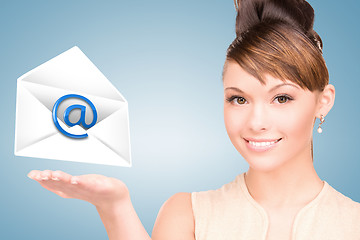 Image showing woman showing virtual envelope