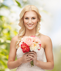 Image showing woman with bouquet of flowers