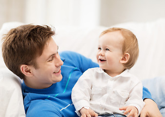 Image showing happy father with adorable baby