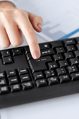 Image showing woman hand pressing enter button on keyboard