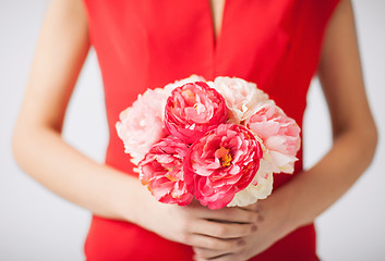 Image showing woman hands with bouquet of flowers