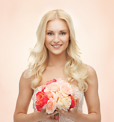 Image showing woman with bouquet of flowers