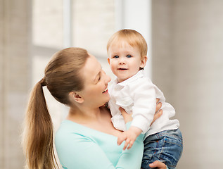 Image showing happy mother with adorable baby