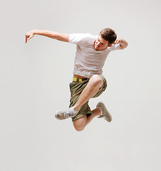 Image showing male dancer jumping in the air