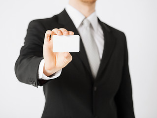 Image showing man hand with blank paper