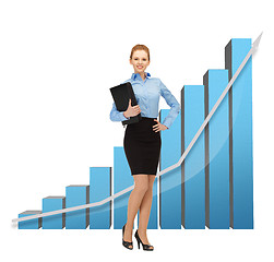 Image showing businesswoman with big 3d chart and folder