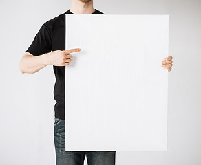 Image showing man with blank white board