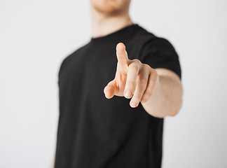 Image showing man pointing his finger at you