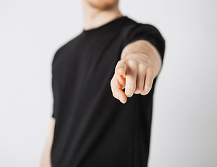 Image showing man pointing his finger at you