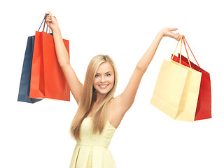 Image showing excited woman with shopping bags