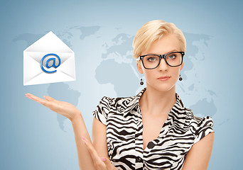 Image showing woman showing virtual envelope