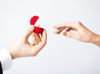 Image showing couple with wedding ring and gift box