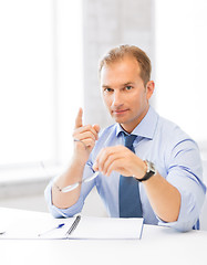 Image showing businessman showing warning gesture