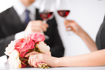 Image showing engaged couple with wine glasses