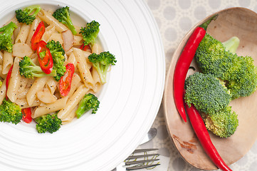 Image showing Italian penne pasta with broccoli and chili pepper