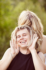 Image showing Man trying on long hair