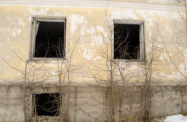 Image showing abandoned masonry brick house wall broken windows 