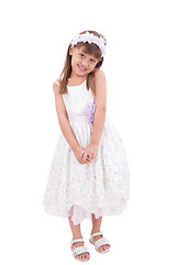 Image showing smiling little girl in white dress 