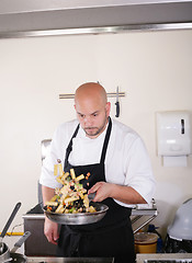 Image showing chef prepare tasty food in kitchen 