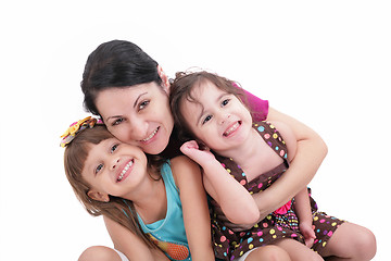 Image showing Happy mother and two daughters. Isolated on white background