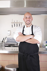 Image showing Portrait of young male chef in commercial kitchen