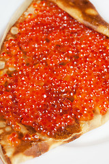 Image showing Pancake with red caviar