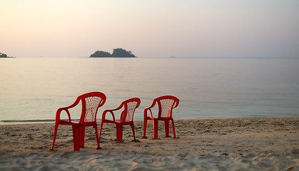 Image showing Empty beach three chair 