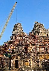 Image showing Tower crane in the temple of Angkor Wat