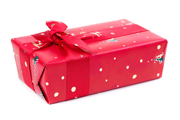 Image showing Red gift box with ribbon and bow isolated on the white backgroun