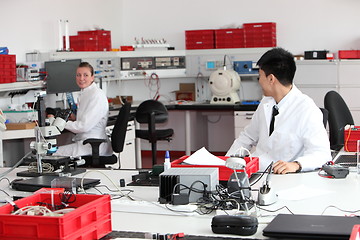 Image showing Technicians working in a modern laboratory