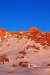 Image showing Sunrise in snow mountains