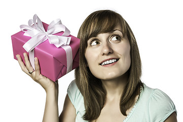 Image showing pretty girl listens to a gift