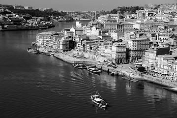 Image showing Portugal. Porto city. View of Douro river embankment  in black a