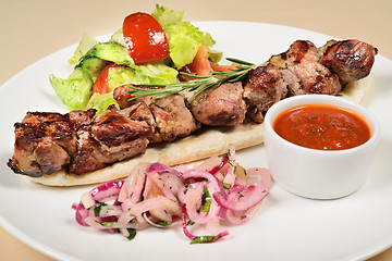 Image showing Kebab on a pita