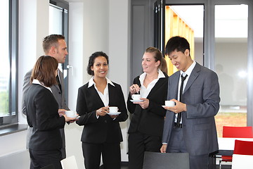 Image showing Group of diverse businesspeople on coffee break