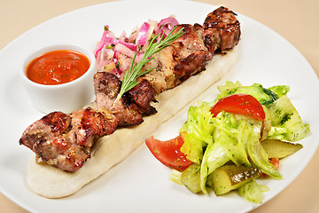 Image showing Kebab on a pita