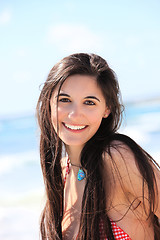 Image showing Portrait of a beautiful woman at the beach