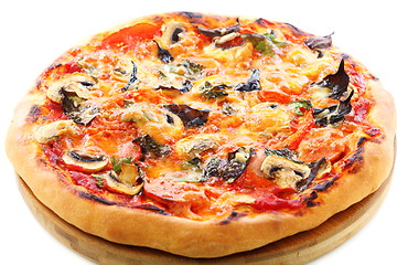 Image showing Pizza with tomatoes, mushrooms and purple basil.