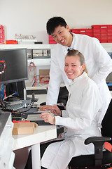 Image showing Two technicians at work in a laboratory