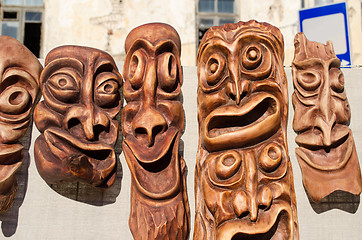 Image showing wooden carved funny masks spring fair rural crafts 