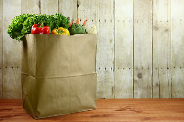 Image showing Bag of Grocery Produce Items on a Wooden Plank