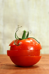 Image showing Tomatoes on a Rustic Wood Plank