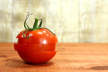 Image showing Tomatoes on a Rustic Wood Plank