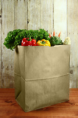 Image showing Bag of Grocery Produce Items on a Wooden Plank