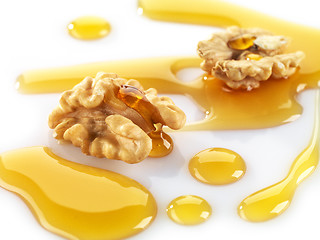 Image showing walnuts and maple syrup