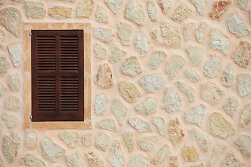 Image showing Window with closed wooden shutters