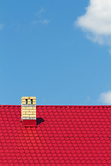 Image showing Red roof with chimney