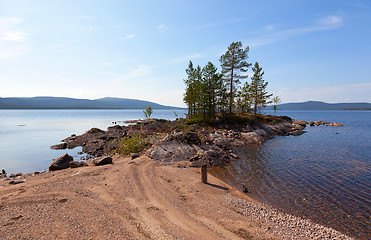 Image showing A picturesque lake with a pebble beach in the north of Russia