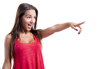 Image showing Beautiful woman pointing to something